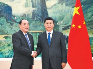 習近平會見賀一誠