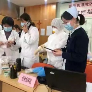 疫情防控“守門人”記農工黨長寧區委社區家庭醫生黨員